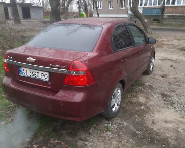 Красный Шевроле Авео, объемом двигателя 1.6 л и пробегом 209 тыс. км за 3500 $, фото 2 на Automoto.ua