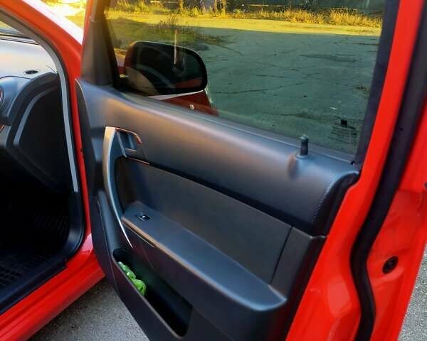 Красный Шевроле Авео, объемом двигателя 1.5 л и пробегом 65 тыс. км за 5500 $, фото 43 на Automoto.ua