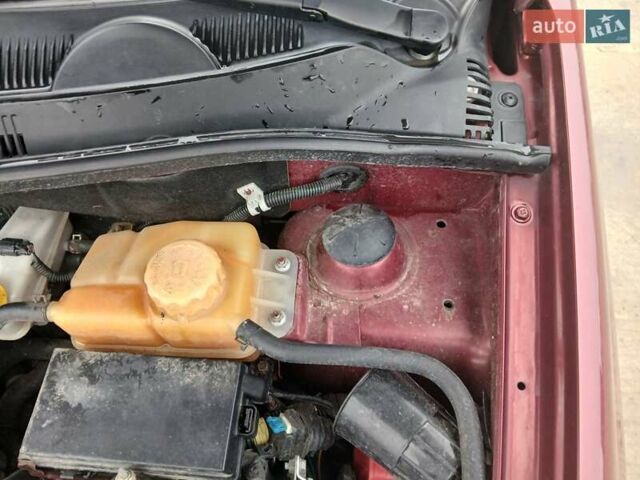 Красный Шевроле Авео, объемом двигателя 1.6 л и пробегом 91 тыс. км за 4800 $, фото 21 на Automoto.ua