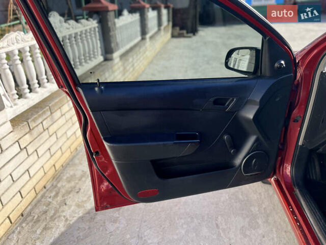 Червоний Шевроле Авео, об'ємом двигуна 1.5 л та пробігом 178 тис. км за 2999 $, фото 20 на Automoto.ua