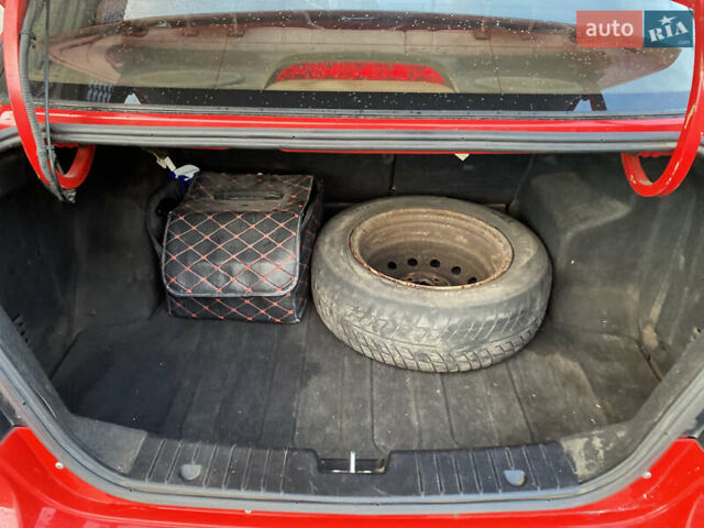 Красный Шевроле Авео, объемом двигателя 1.5 л и пробегом 270 тыс. км за 2999 $, фото 36 на Automoto.ua