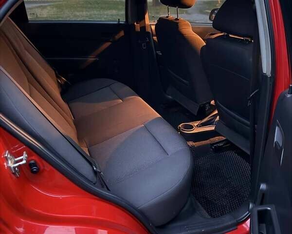 Червоний Шевроле Авео, об'ємом двигуна 1.5 л та пробігом 208 тис. км за 4200 $, фото 26 на Automoto.ua