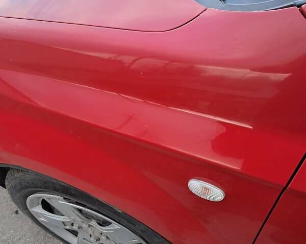 Красный Шевроле Авео, объемом двигателя 1.5 л и пробегом 237 тыс. км за 3600 $, фото 1 на Automoto.ua