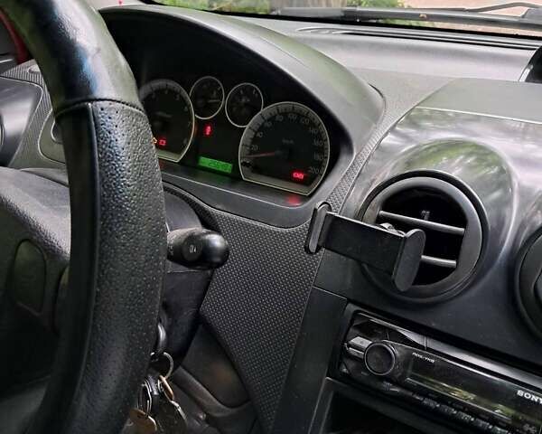 Красный Шевроле Авео, объемом двигателя 1.5 л и пробегом 256 тыс. км за 3200 $, фото 22 на Automoto.ua