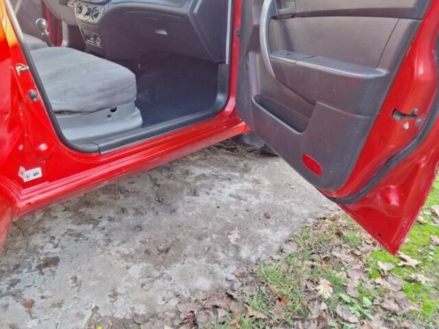 Красный Шевроле Авео, объемом двигателя 1.5 л и пробегом 290 тыс. км за 2499 $, фото 4 на Automoto.ua