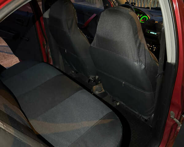 Червоний Шевроле Авео, об'ємом двигуна 1.5 л та пробігом 213 тис. км за 2600 $, фото 26 на Automoto.ua