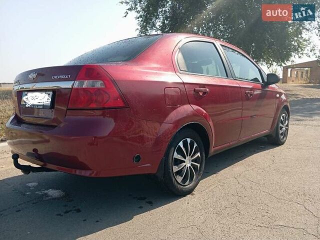 Красный Шевроле Авео, объемом двигателя 1.6 л и пробегом 261 тыс. км за 3600 $, фото 4 на Automoto.ua