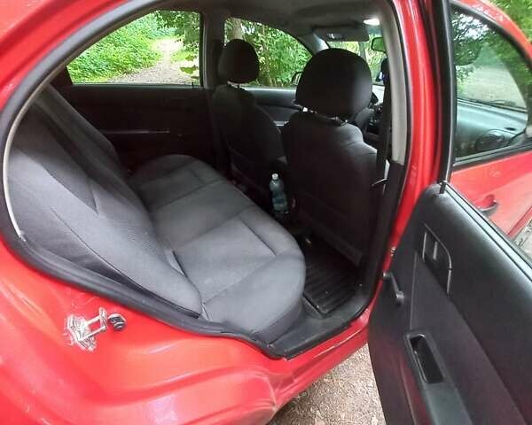 Красный Шевроле Авео, объемом двигателя 1.5 л и пробегом 256 тыс. км за 3200 $, фото 15 на Automoto.ua