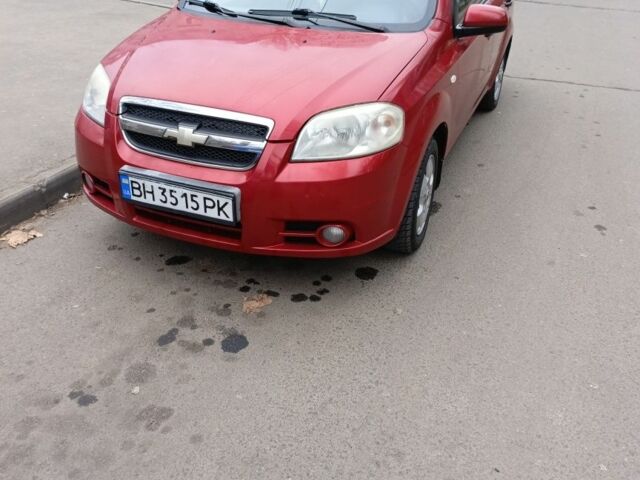 Красный Шевроле Авео, объемом двигателя 1.5 л и пробегом 210 тыс. км за 4000 $, фото 2 на Automoto.ua