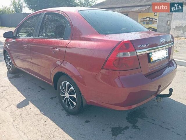 Красный Шевроле Авео, объемом двигателя 1.6 л и пробегом 261 тыс. км за 3600 $, фото 2 на Automoto.ua