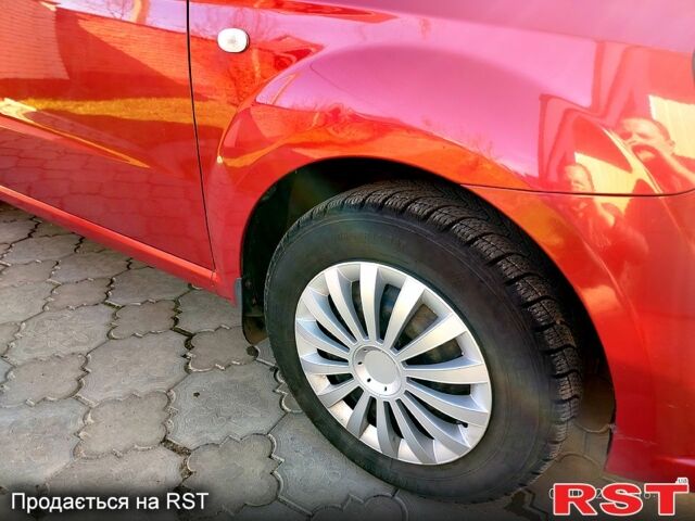 Красный Шевроле Авео, объемом двигателя 1.5 л и пробегом 200 тыс. км за 4000 $, фото 6 на Automoto.ua
