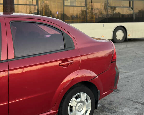 Червоний Шевроле Авео, об'ємом двигуна 1.5 л та пробігом 213 тис. км за 2600 $, фото 8 на Automoto.ua