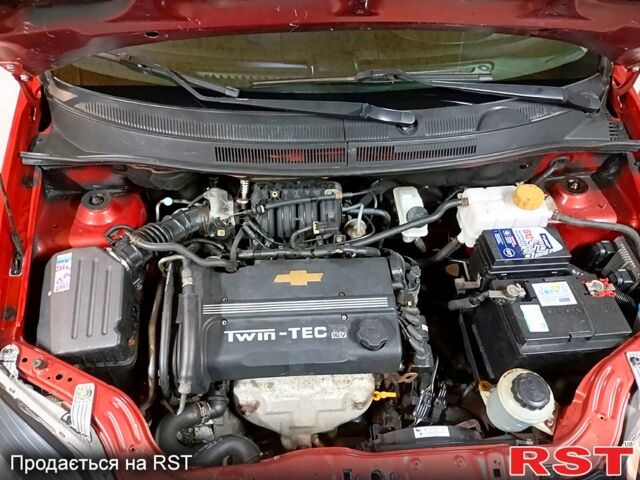 Красный Шевроле Авео, объемом двигателя 1.5 л и пробегом 157 тыс. км за 3600 $, фото 4 на Automoto.ua