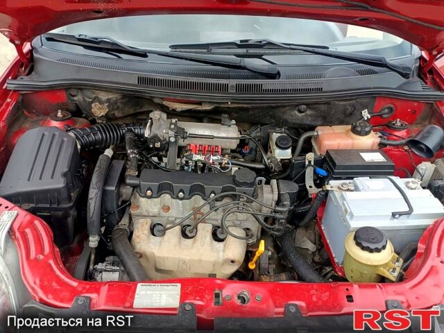 Красный Шевроле Авео, объемом двигателя 1.5 л и пробегом 307 тыс. км за 3800 $, фото 9 на Automoto.ua