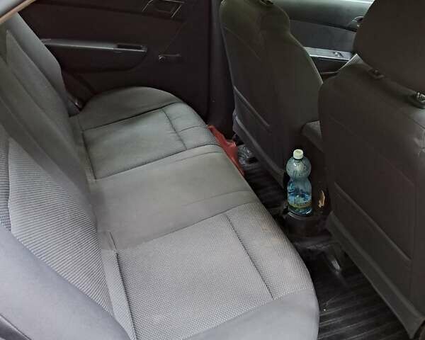 Красный Шевроле Авео, объемом двигателя 1.5 л и пробегом 256 тыс. км за 3200 $, фото 21 на Automoto.ua