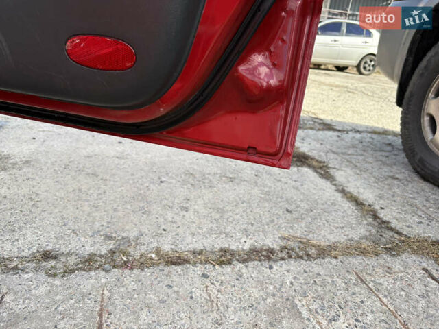 Красный Шевроле Авео, объемом двигателя 1.5 л и пробегом 263 тыс. км за 4500 $, фото 10 на Automoto.ua