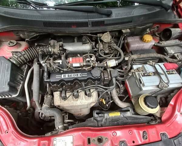 Красный Шевроле Авео, объемом двигателя 1.5 л и пробегом 256 тыс. км за 3200 $, фото 17 на Automoto.ua