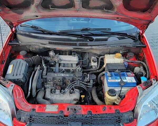 Красный Шевроле Авео, объемом двигателя 1.5 л и пробегом 151 тыс. км за 4900 $, фото 19 на Automoto.ua