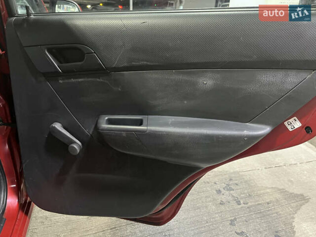 Красный Шевроле Авео, объемом двигателя 1.5 л и пробегом 34 тыс. км за 6300 $, фото 11 на Automoto.ua