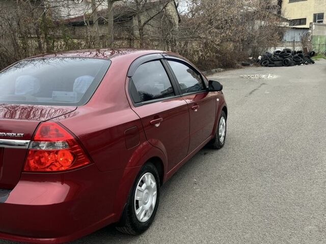 Красный Шевроле Авео, объемом двигателя 1.6 л и пробегом 210 тыс. км за 4300 $, фото 4 на Automoto.ua