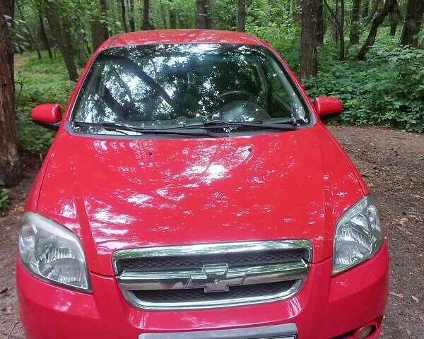 Красный Шевроле Авео, объемом двигателя 1.5 л и пробегом 256 тыс. км за 3200 $, фото 1 на Automoto.ua