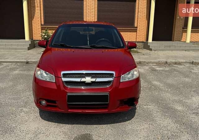 Красный Шевроле Авео, объемом двигателя 1.5 л и пробегом 329 тыс. км за 2900 $, фото 1 на Automoto.ua
