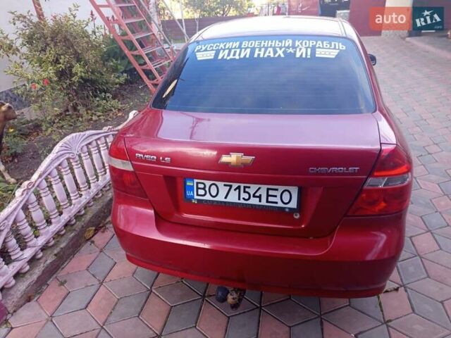 Красный Шевроле Авео, объемом двигателя 1.5 л и пробегом 200 тыс. км за 3400 $, фото 1 на Automoto.ua