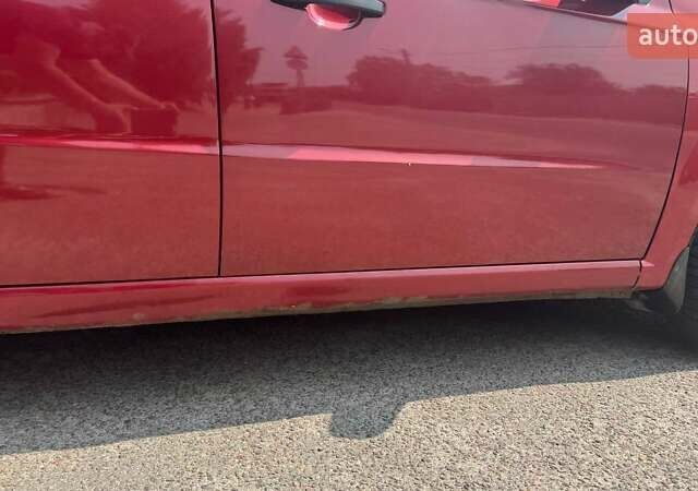 Красный Шевроле Авео, объемом двигателя 1.5 л и пробегом 329 тыс. км за 2900 $, фото 19 на Automoto.ua