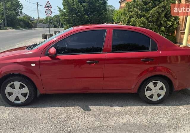 Красный Шевроле Авео, объемом двигателя 1.5 л и пробегом 329 тыс. км за 2900 $, фото 2 на Automoto.ua