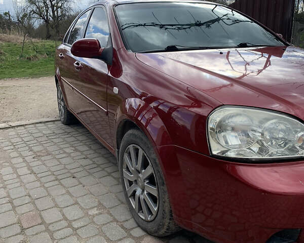 Червоний Шевроле Авео, об'ємом двигуна 1.8 л та пробігом 220 тис. км за 3700 $, фото 2 на Automoto.ua