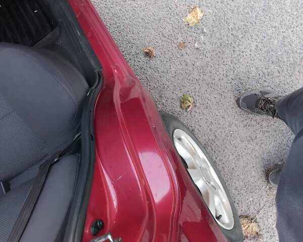 Красный Шевроле Авео, объемом двигателя 1.5 л и пробегом 228 тыс. км за 3700 $, фото 4 на Automoto.ua