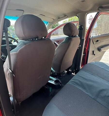 Красный Шевроле Авео, объемом двигателя 1.5 л и пробегом 329 тыс. км за 2900 $, фото 10 на Automoto.ua