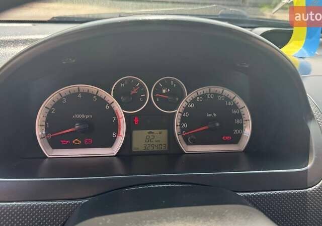 Красный Шевроле Авео, объемом двигателя 1.5 л и пробегом 329 тыс. км за 2900 $, фото 14 на Automoto.ua