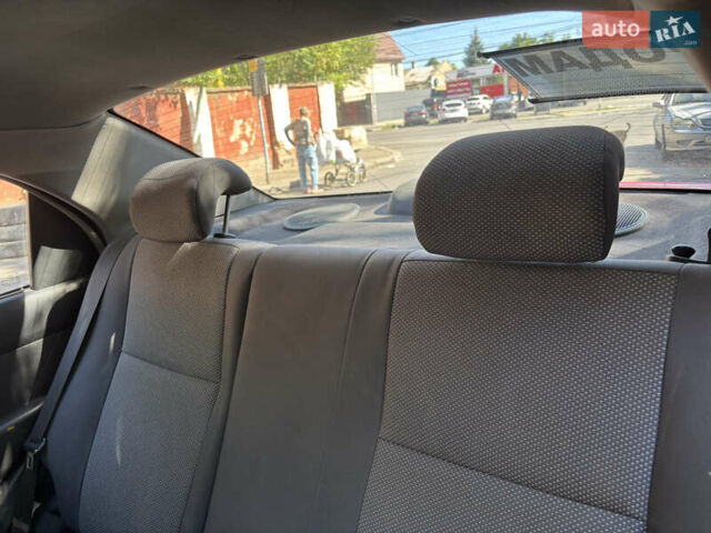 Красный Шевроле Авео, объемом двигателя 1.5 л и пробегом 250 тыс. км за 3400 $, фото 14 на Automoto.ua