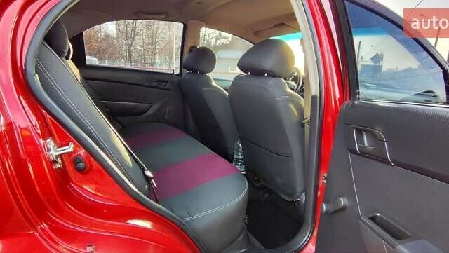Красный Шевроле Авео, объемом двигателя 1.4 л и пробегом 202 тыс. км за 3600 $, фото 14 на Automoto.ua