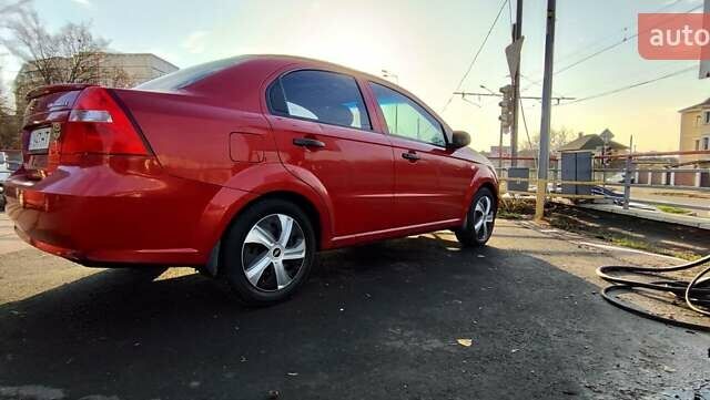 Красный Шевроле Авео, объемом двигателя 1.4 л и пробегом 202 тыс. км за 3600 $, фото 1 на Automoto.ua