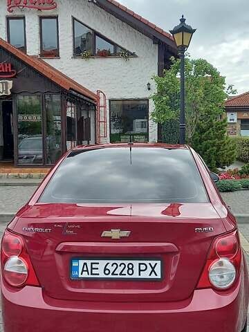 Красный Шевроле Авео, объемом двигателя 1.6 л и пробегом 98 тыс. км за 7200 $, фото 6 на Automoto.ua