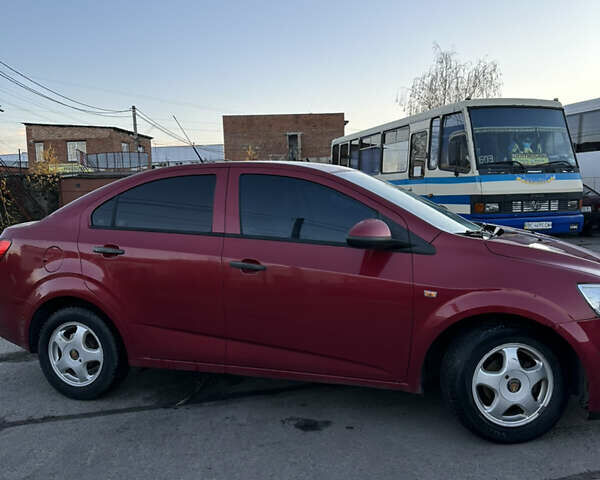 Червоний Шевроле Авео, об'ємом двигуна 1.4 л та пробігом 116 тис. км за 5500 $, фото 3 на Automoto.ua