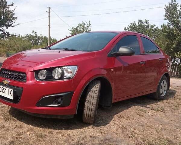 Красный Шевроле Авео, объемом двигателя 1.4 л и пробегом 61 тыс. км за 7300 $, фото 1 на Automoto.ua