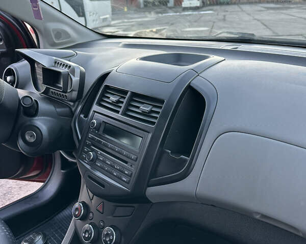 Червоний Шевроле Авео, об'ємом двигуна 1.4 л та пробігом 116 тис. км за 5500 $, фото 13 на Automoto.ua