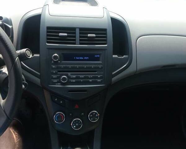 Красный Шевроле Авео, объемом двигателя 1.4 л и пробегом 61 тыс. км за 7300 $, фото 7 на Automoto.ua