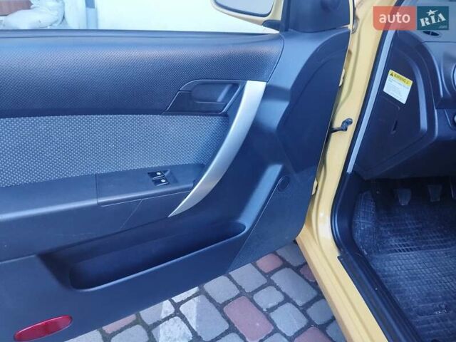 Желтый Шевроле Авео, объемом двигателя 1.21 л и пробегом 140 тыс. км за 3890 $, фото 41 на Automoto.ua