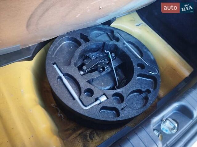 Желтый Шевроле Авео, объемом двигателя 1.21 л и пробегом 145 тыс. км за 4250 $, фото 18 на Automoto.ua