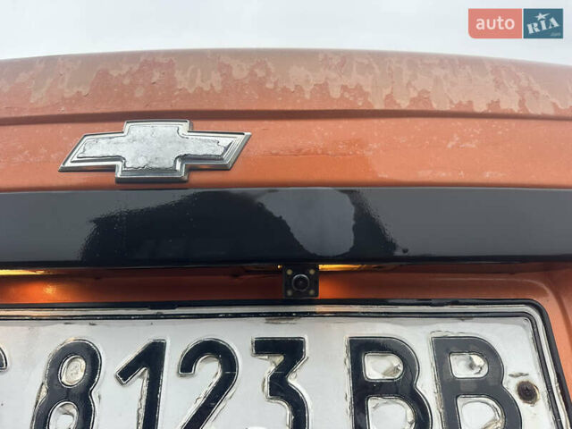 Желтый Шевроле Авео, объемом двигателя 1.5 л и пробегом 206 тыс. км за 1790 $, фото 10 на Automoto.ua