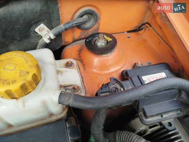 Жовтий Шевроле Авео, об'ємом двигуна 1.5 л та пробігом 106 тис. км за 4550 $, фото 10 на Automoto.ua