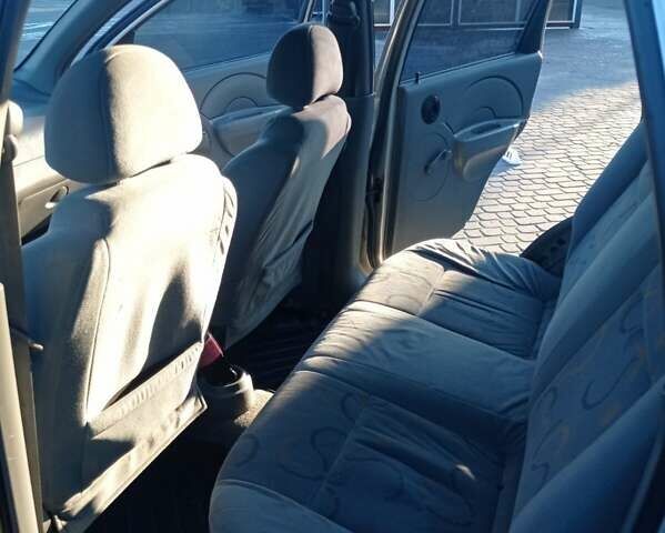 Серый Шевроле Авео, объемом двигателя 1.5 л и пробегом 445 тыс. км за 1600 $, фото 7 на Automoto.ua