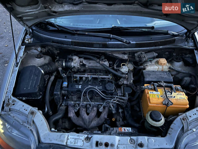 Серый Шевроле Авео, объемом двигателя 1.5 л и пробегом 260 тыс. км за 2200 $, фото 5 на Automoto.ua