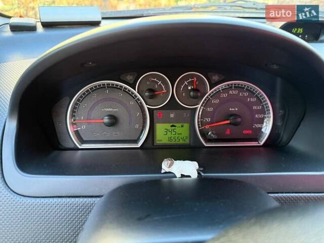 Серый Шевроле Авео, объемом двигателя 1.5 л и пробегом 165 тыс. км за 5000 $, фото 14 на Automoto.ua