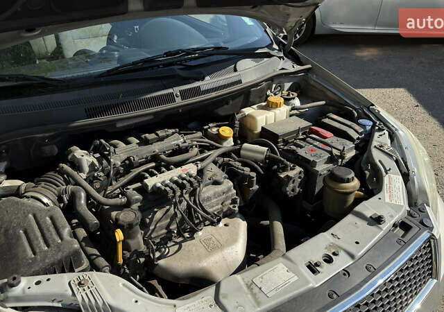 Сірий Шевроле Авео, об'ємом двигуна 1.21 л та пробігом 210 тис. км за 4500 $, фото 12 на Automoto.ua
