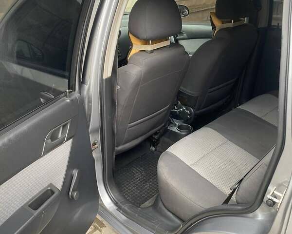 Серый Шевроле Авео, объемом двигателя 1.4 л и пробегом 165 тыс. км за 3800 $, фото 2 на Automoto.ua